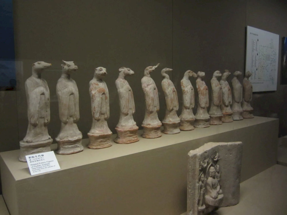 The artifacts on display at the museum include statues, ceramics, and calligraphy